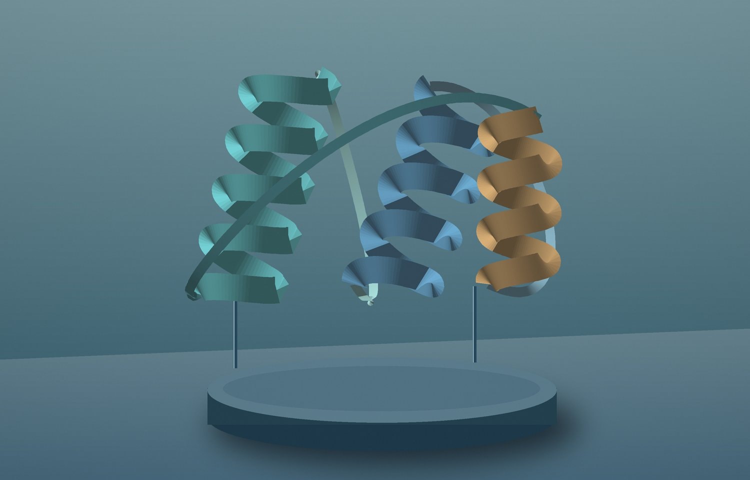 A folded blue, green and bronze ribbon sculpture on a round desk pedestal.